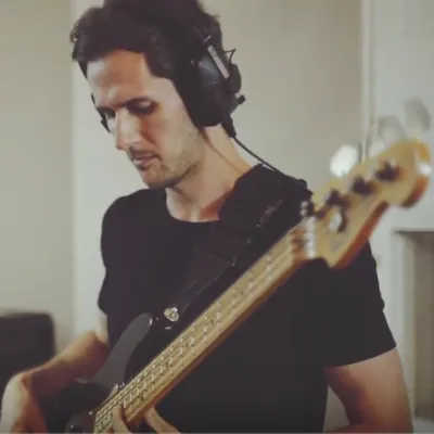 Tom Kenrick playing bass